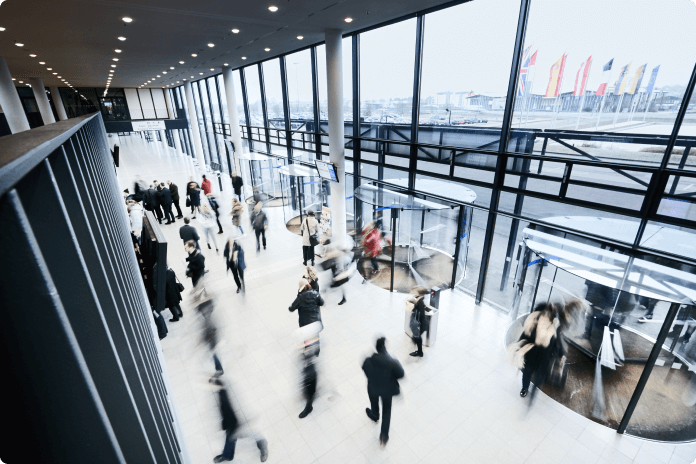 Conference hall lobby with people moving around